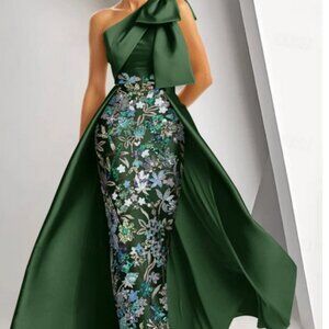 Green evening gown with embroidery